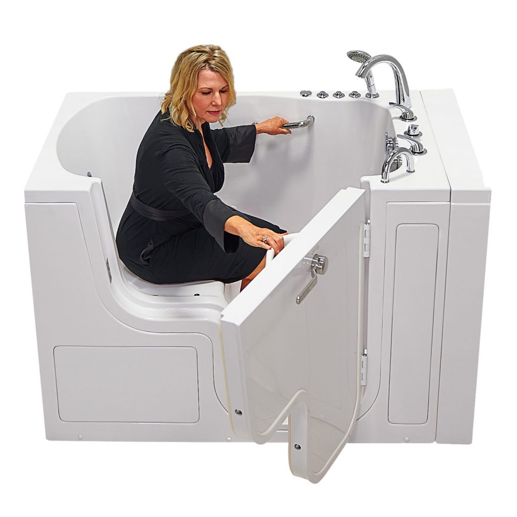 Women close the door of one Bariatric Walk-In Tub from Ella’s Bubbles company. 