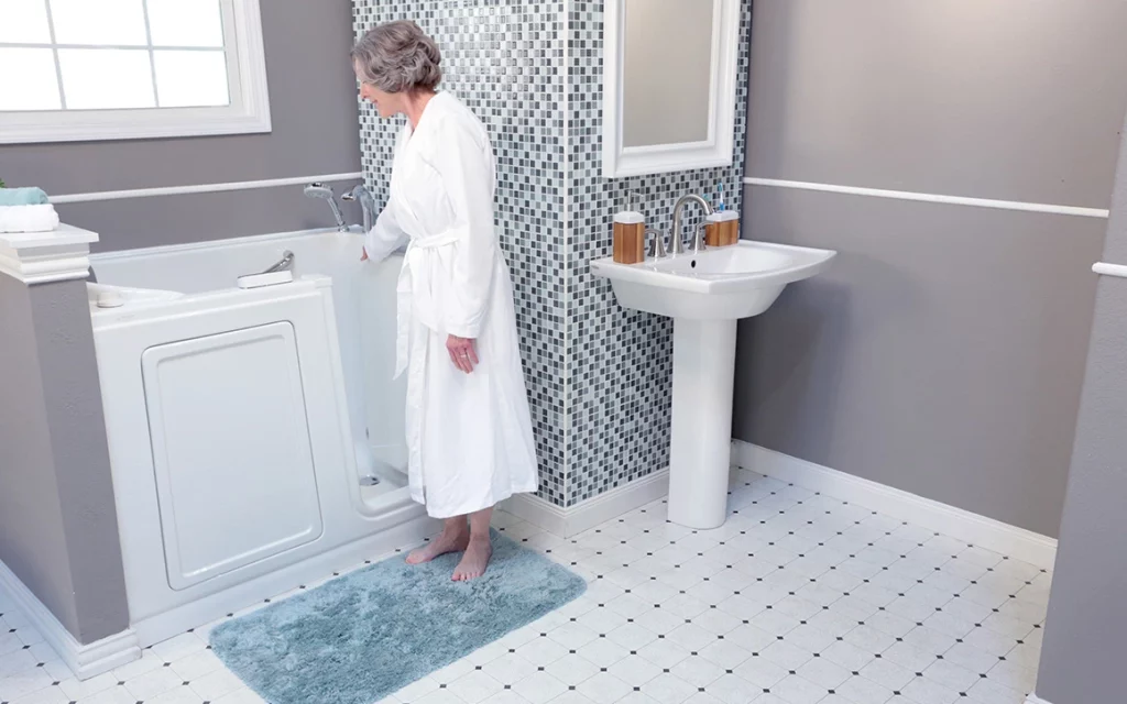Women entry to American Standard Walk-in Tub to have a safe bath